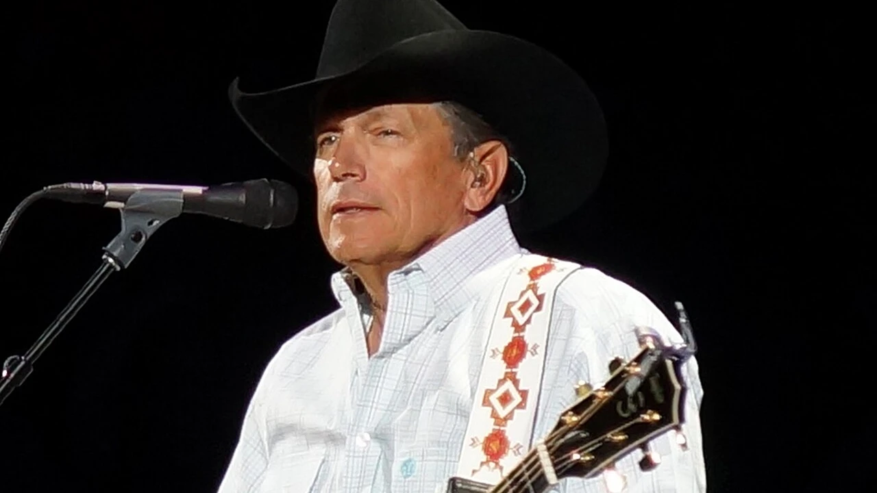 George Strait 2026-2027 Tour & Schedule featuring George Strait live on stage with stadium crowd