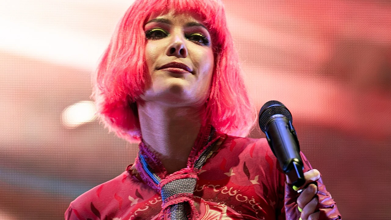Halsey 2026-2027 Tour & Schedule featuring Halsey live on stage with stadium crowd