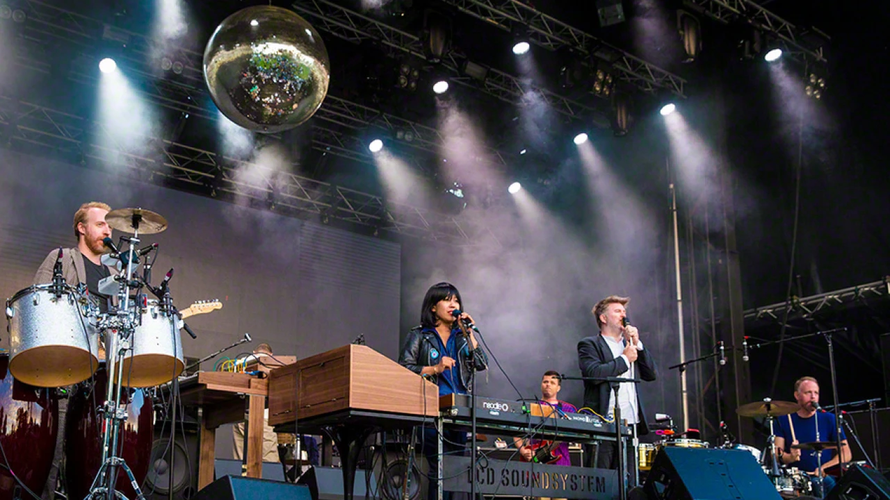 LCD Soundsystem 2026-2027 Tour & Schedule featuring LCD Soundsystem live on stage with stadium crowd